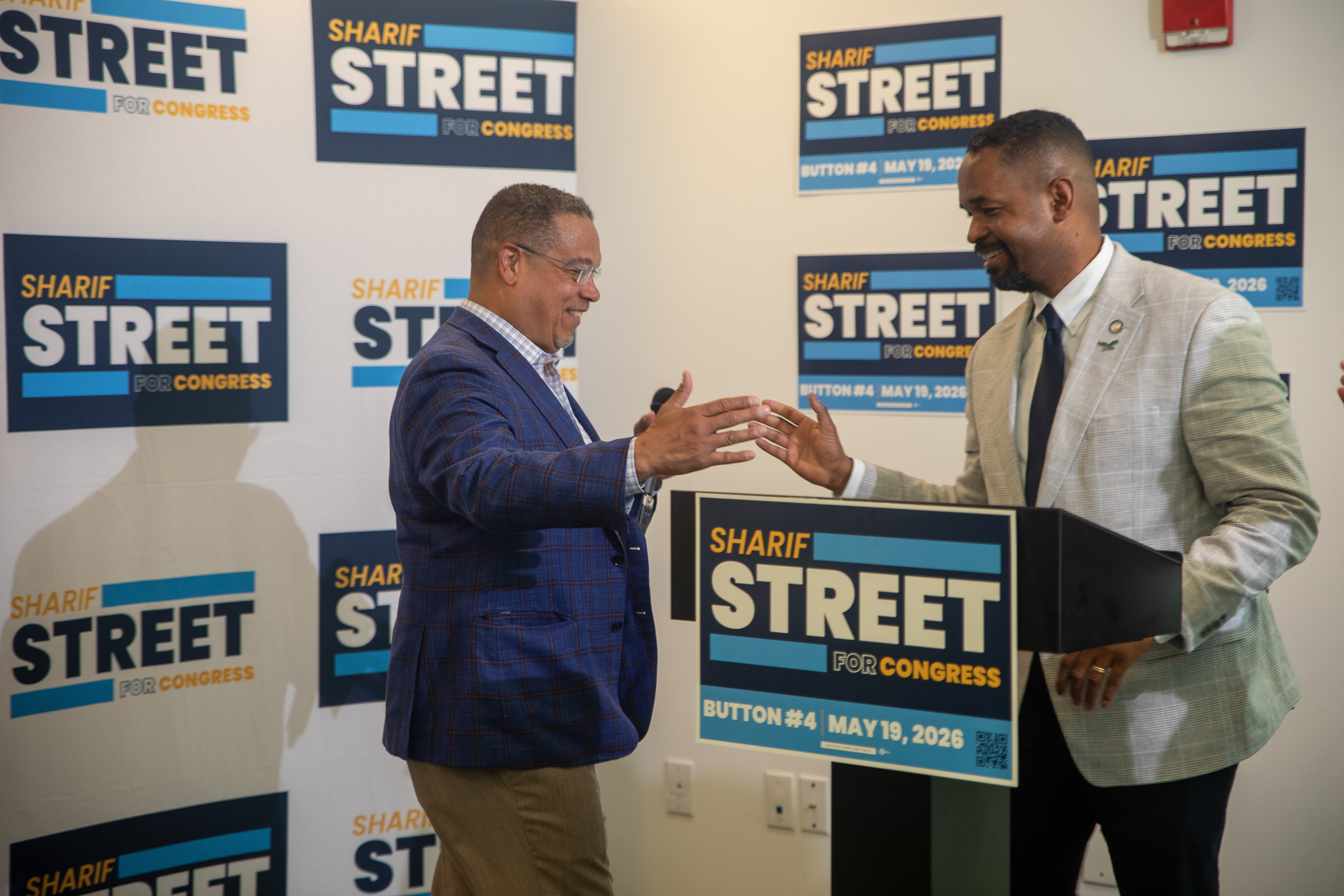 Minnesota Attorney General Keith Ellison greets Sharif Street at a campaign event in Philadelphia, on May 14, 2026.