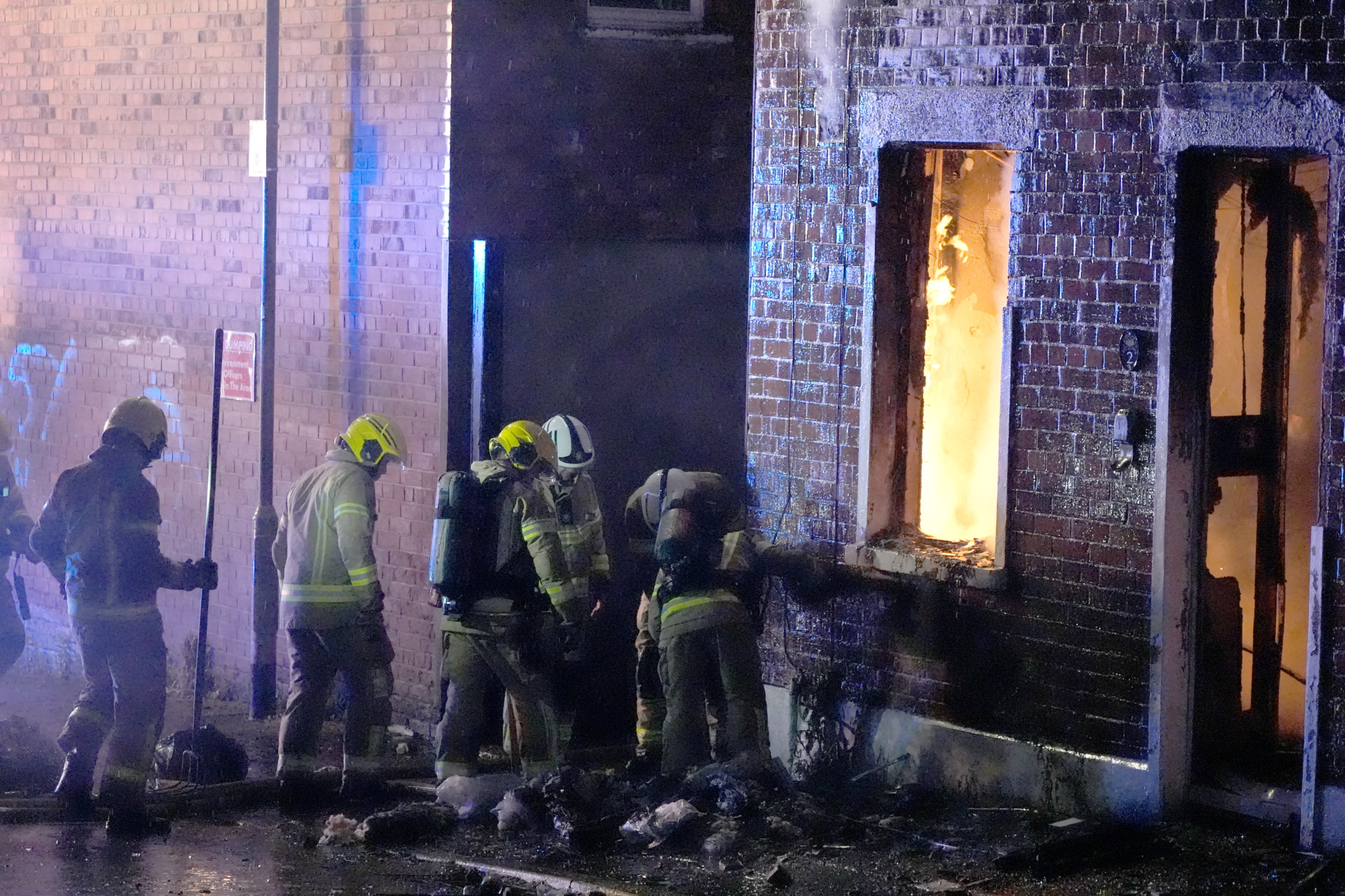 Firefighters attend a house which caught fire on Ligoniel Road, Belfast, as disorder flared during an anti-immigration demonstration organised in response to Monday night's stabbing attack in the city. A 30 year-old man arrested in connection with the Belfast stabbing attack has been charged with attempted murder and will appear in court in the city on Wednesday, the Police Service of Northern Ireland has said. Picture date: Tuesday June 9, 2026. (Photo by PA/PA Images via Getty Images)