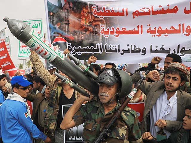 Title: Yemen Iran War Image ID: 26198630293275 Article: Houthi supporters hold a rally in Sanaa, Yemen, Friday, July 17, 2026, against the Saudi-led coalition. Banner in Arabic reads, "All Saudi oil facilities are targets to our missiles and drones." (AP Photo/Osamah Abdulrahman)