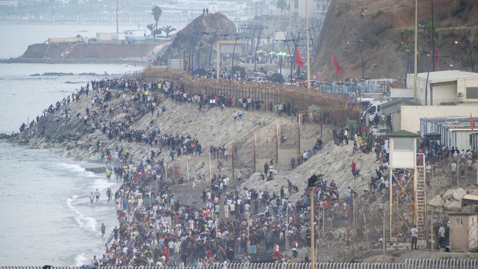 Why did nearly 60,000 migrants suddenly storm the border into Spain?