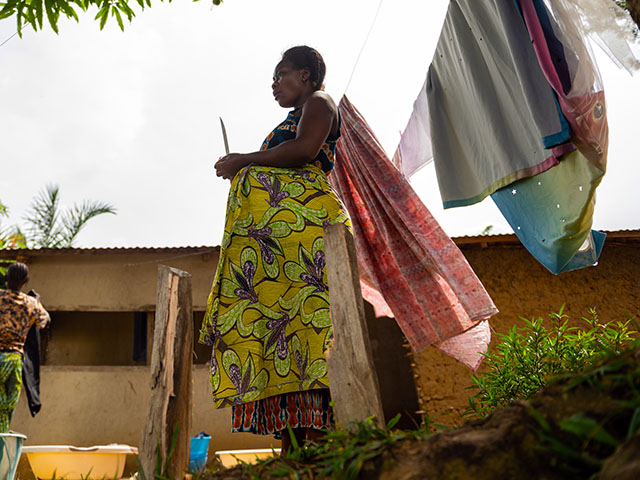 Title: Congo Dying Mothers Ebola Image ID: 26214507266869 Article: Elodie, right, a mother of one who is eight months pregnant, stands outside her house in Bunia, northeastern, Congo, Tuesday, June 16, 2026. (AP Photo/Moses Sawasawa)