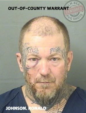 Ronald Jeffrey Johnson in an old mugshot, was wanted in Georgia for making terroristic threats before his arrest in Florida.