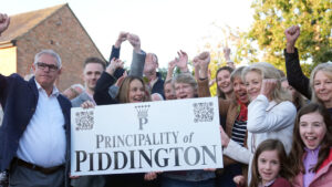 English village votes to leave UK over migrant plan