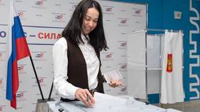 Russia votes: Ruling party on course to secure majority after millions cast ballots