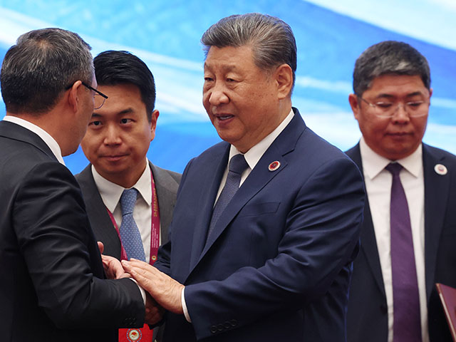 Title: Kyrgyzstan SCO Summit Image ID: 26244355069855 Article: China's President Xi Jinping, centre, and Kyrgyz President Sadyr Zhaparov talk during a meeting in the Shanghai Cooperation Organization (SCO) Plus format in Bishkek, Kyrgyzstan, on Tuesday, Sept. 1, 2026. (Vyacheslav Prokofyev, Sputnik, Kremlin Pool Photo via AP)