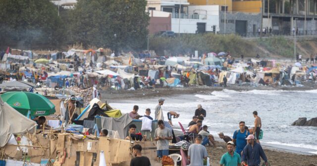 Socialist Sánchez Gov’t Planning to House Up to 10,000 Illegals in Spain’s Ceuta Exclave: Report