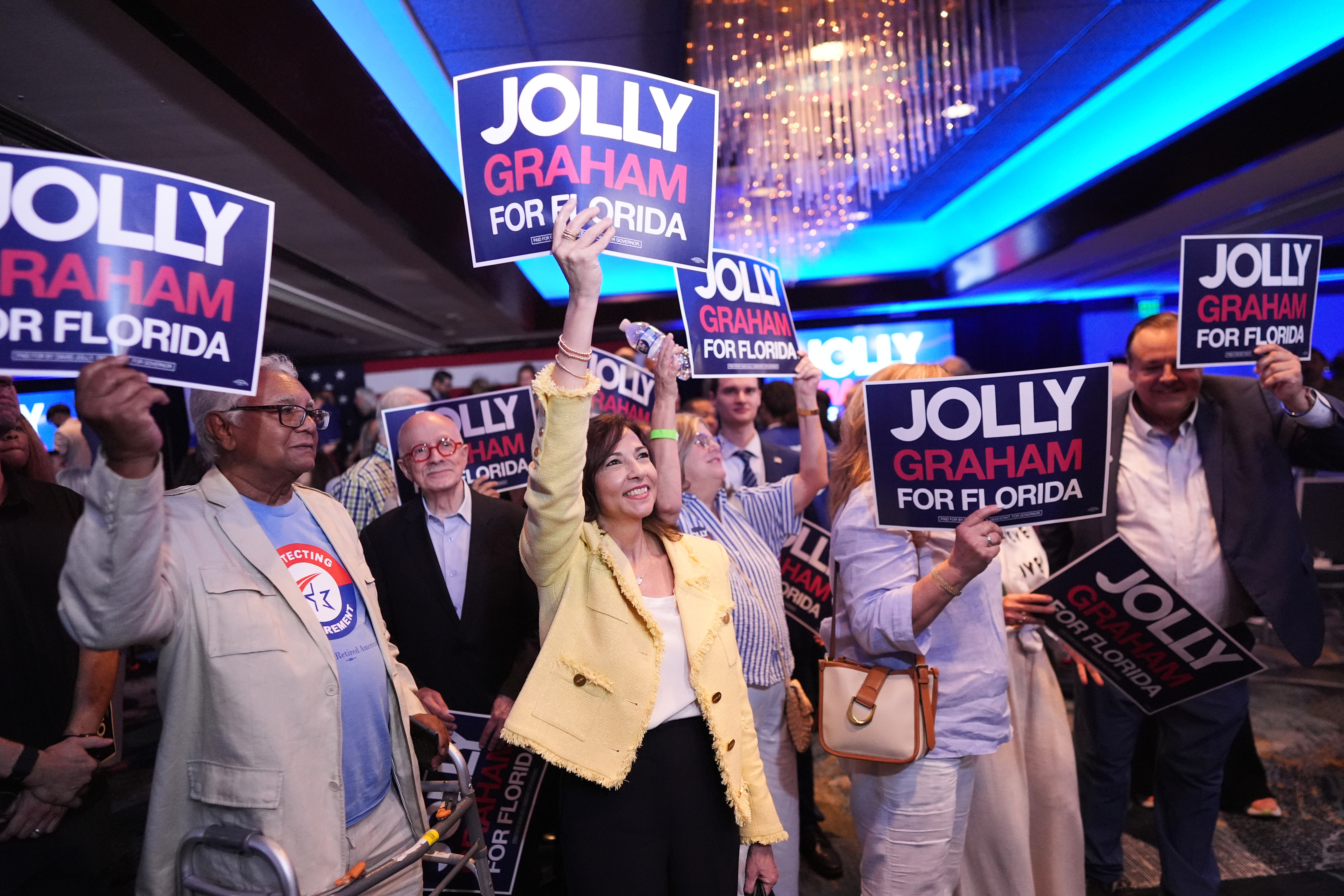 Supporters cheer for Florida Democratic gubernatorial candidate David Jolly and his running mate Gwen Graham at a primary election night watch party on Aug. 18 in Miami Lakes, Florida.