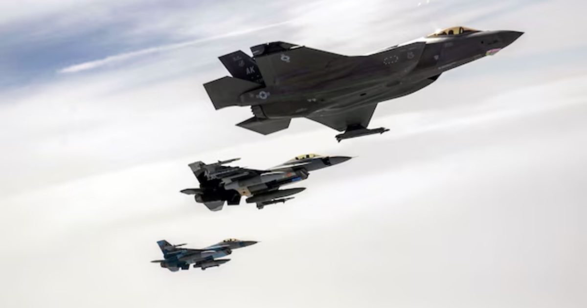 Three military fighter jets flying in formation against a cloudy sky, showcasing advanced aerial technology and defense capabilities.